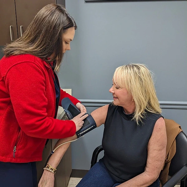 Image of a blood pressure test taking place